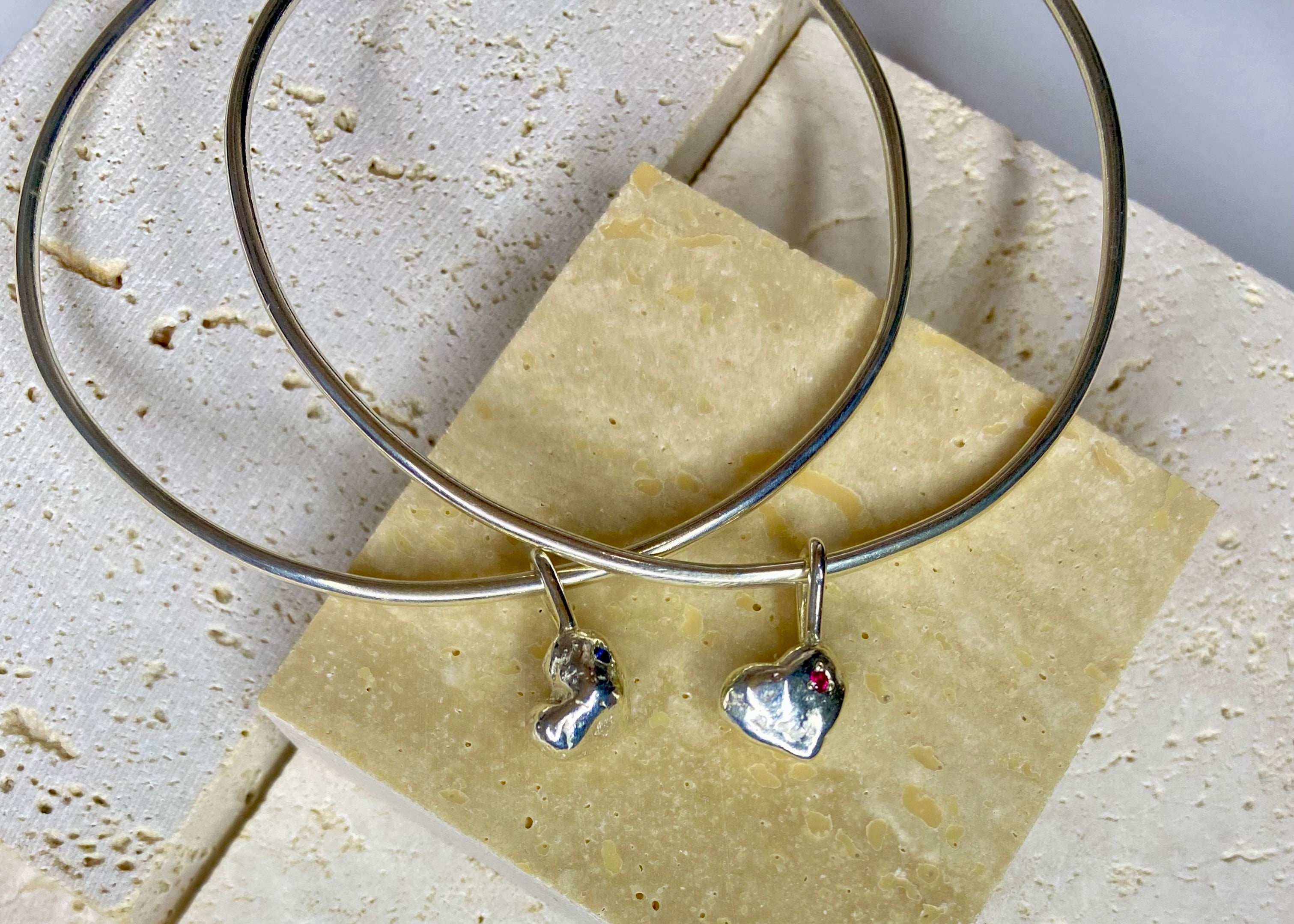 The molten heart charm organic bangle with birthstone