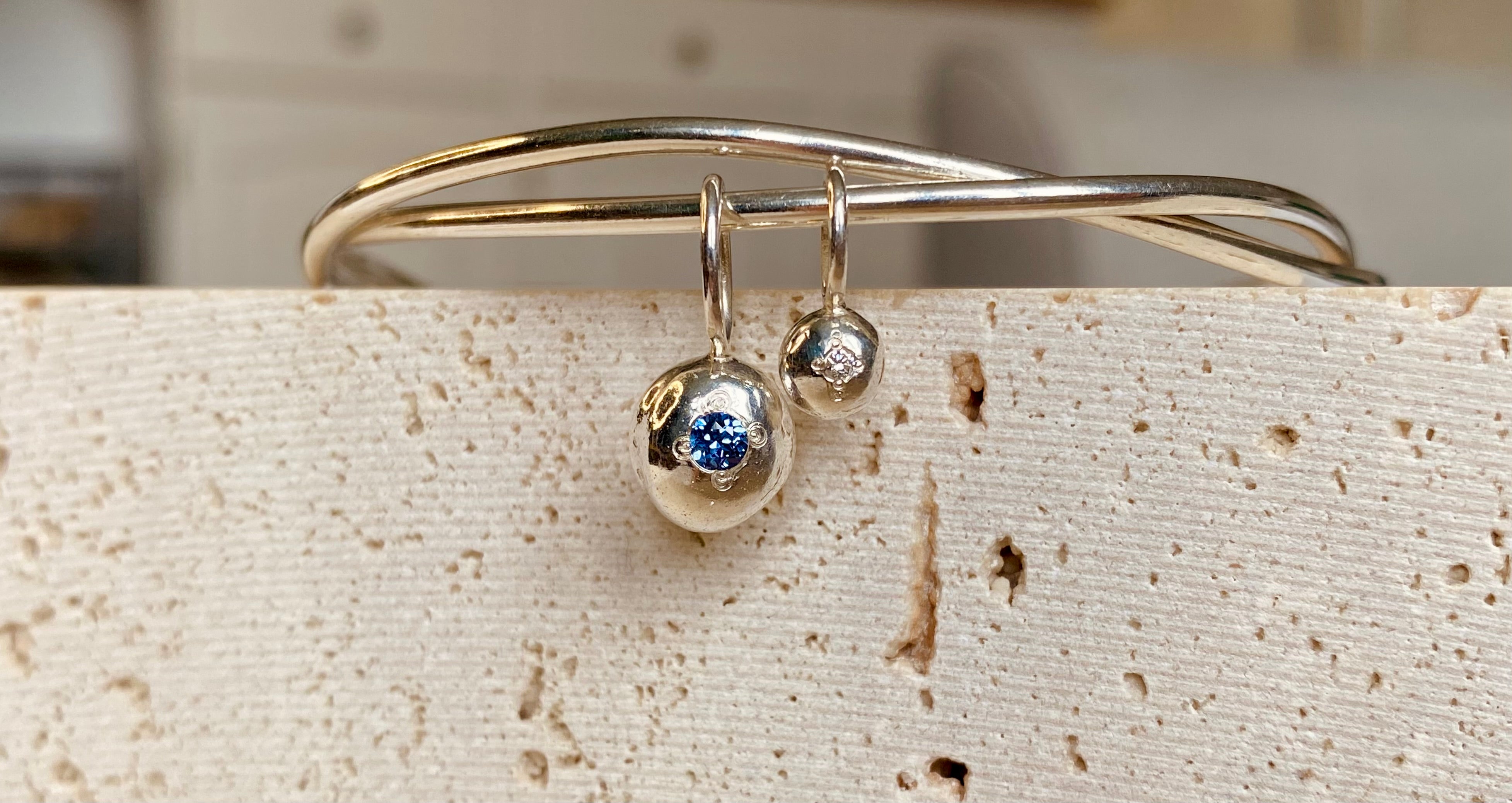 Entwined organic twin Pepita Charms bangle