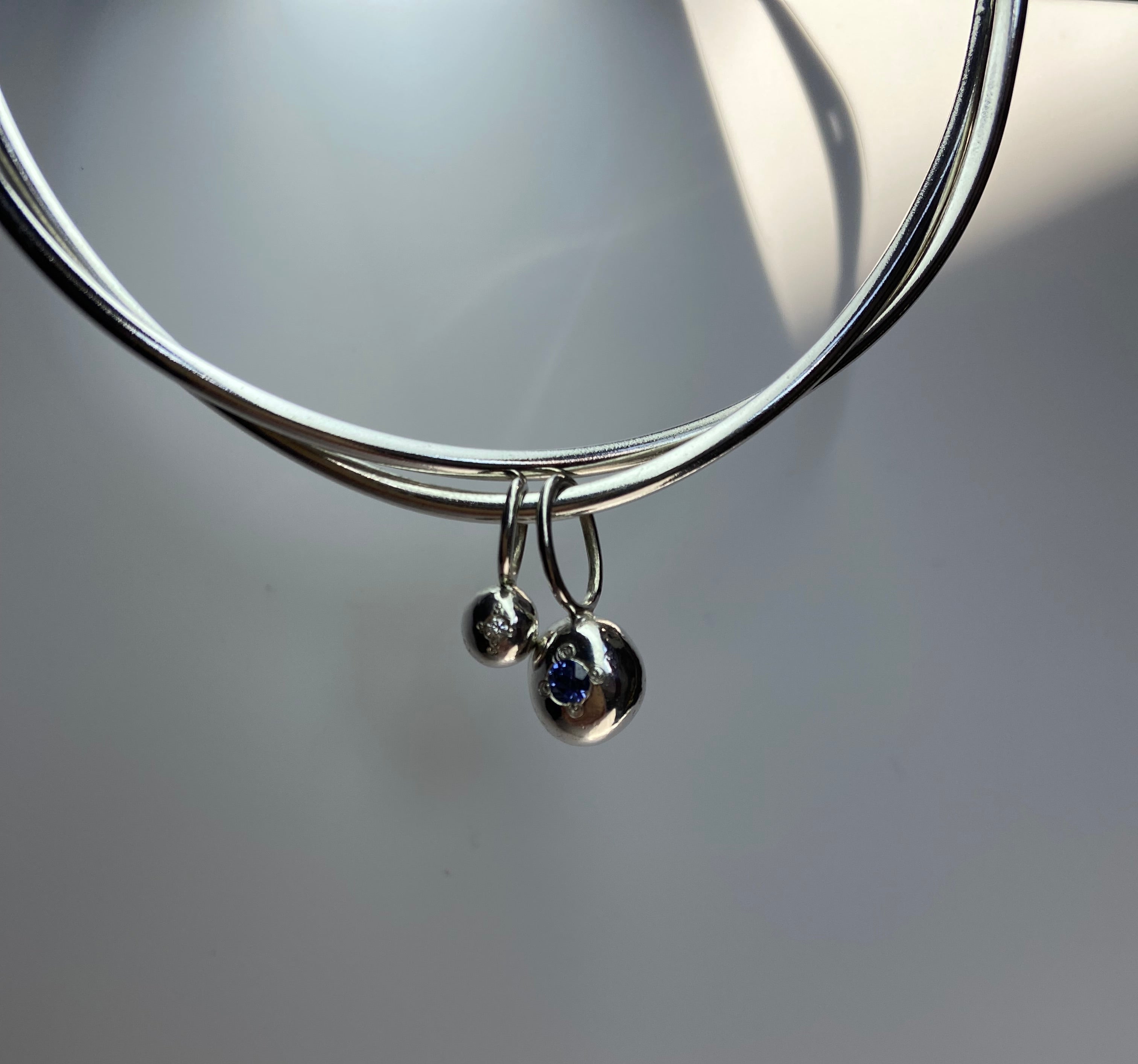 Entwined organic twin Pepita Charms bangle