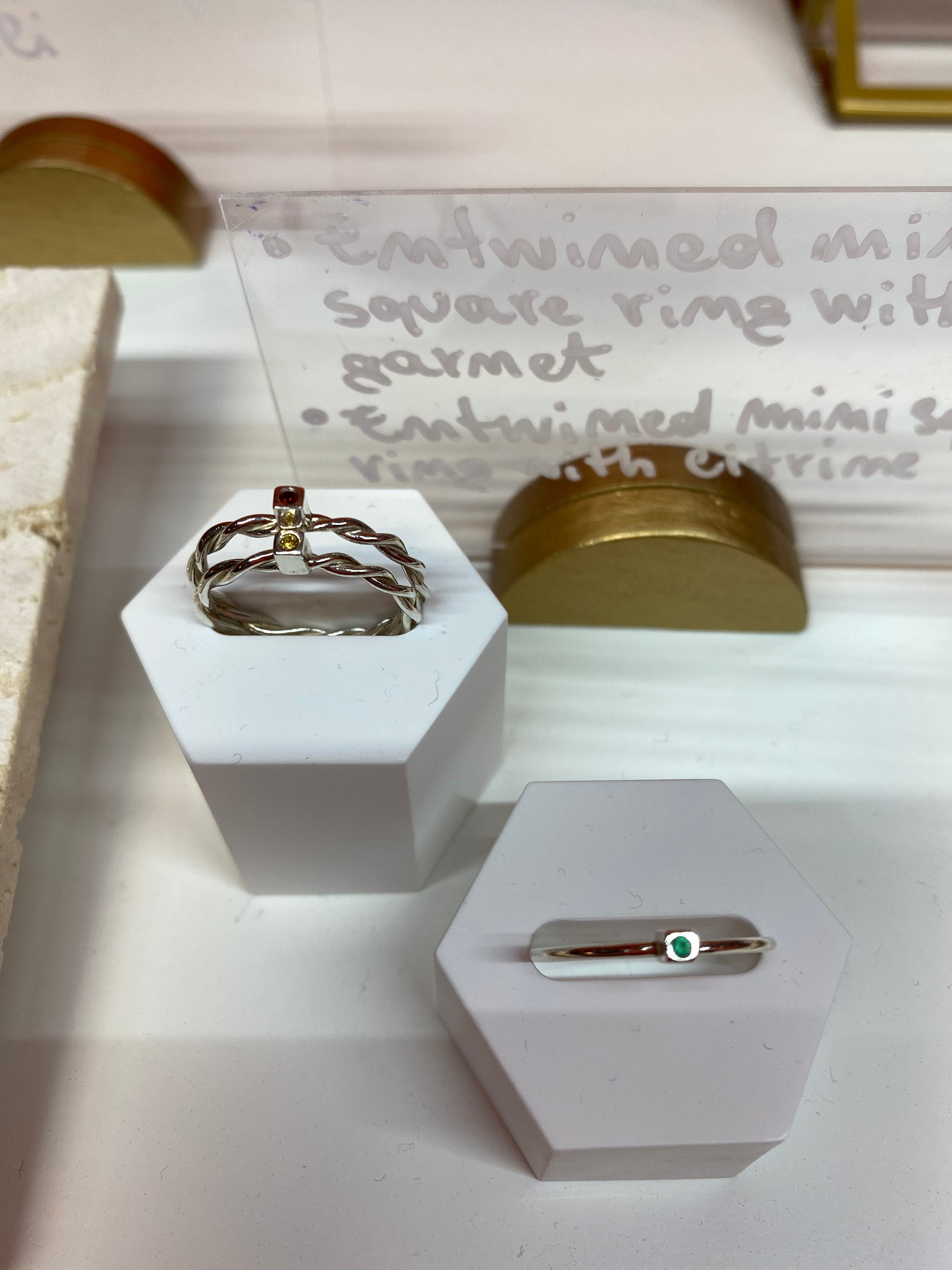 Entwined ring with square birthstone setting