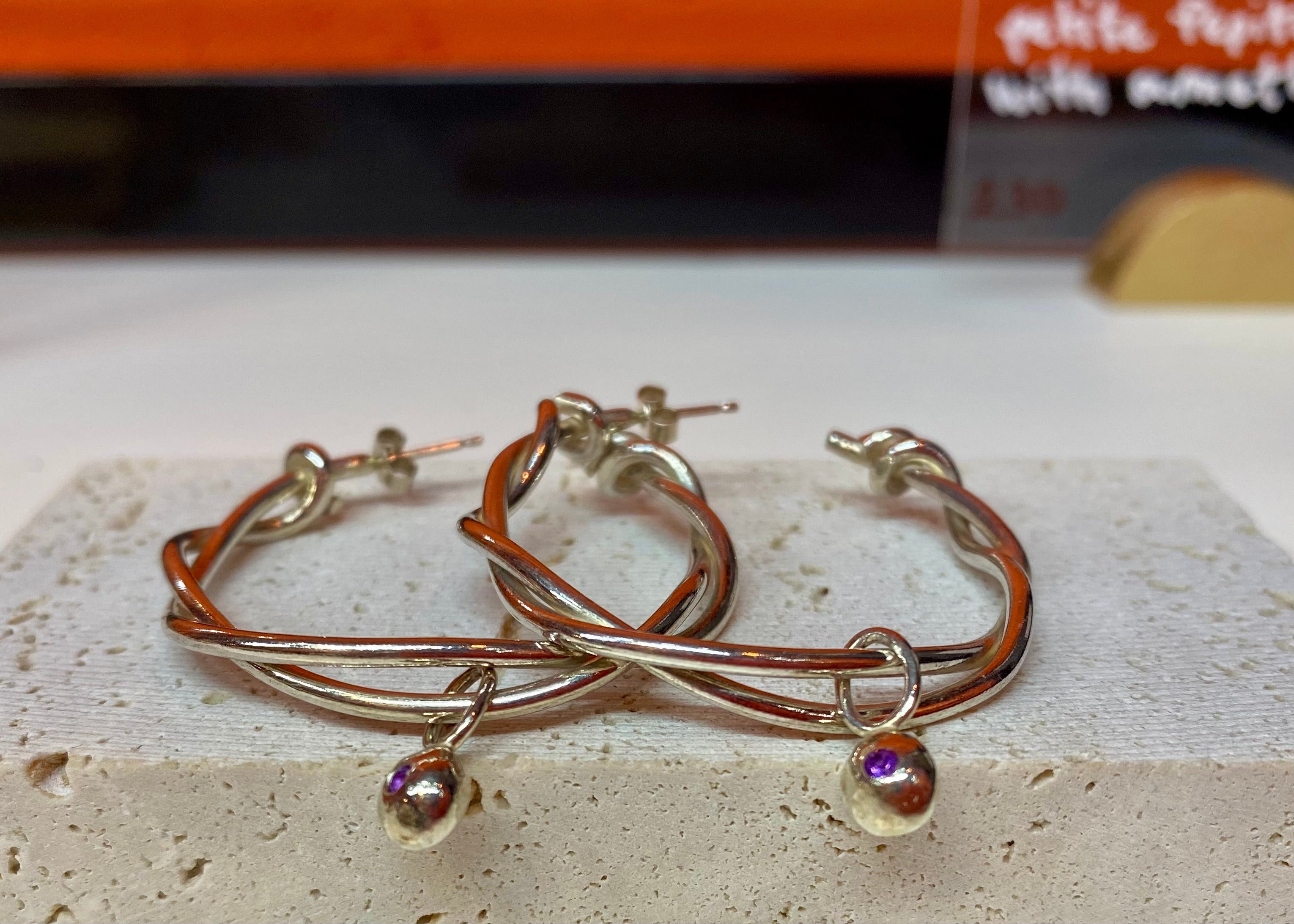 Entwined C-hoops with Petite birthstone Pepita