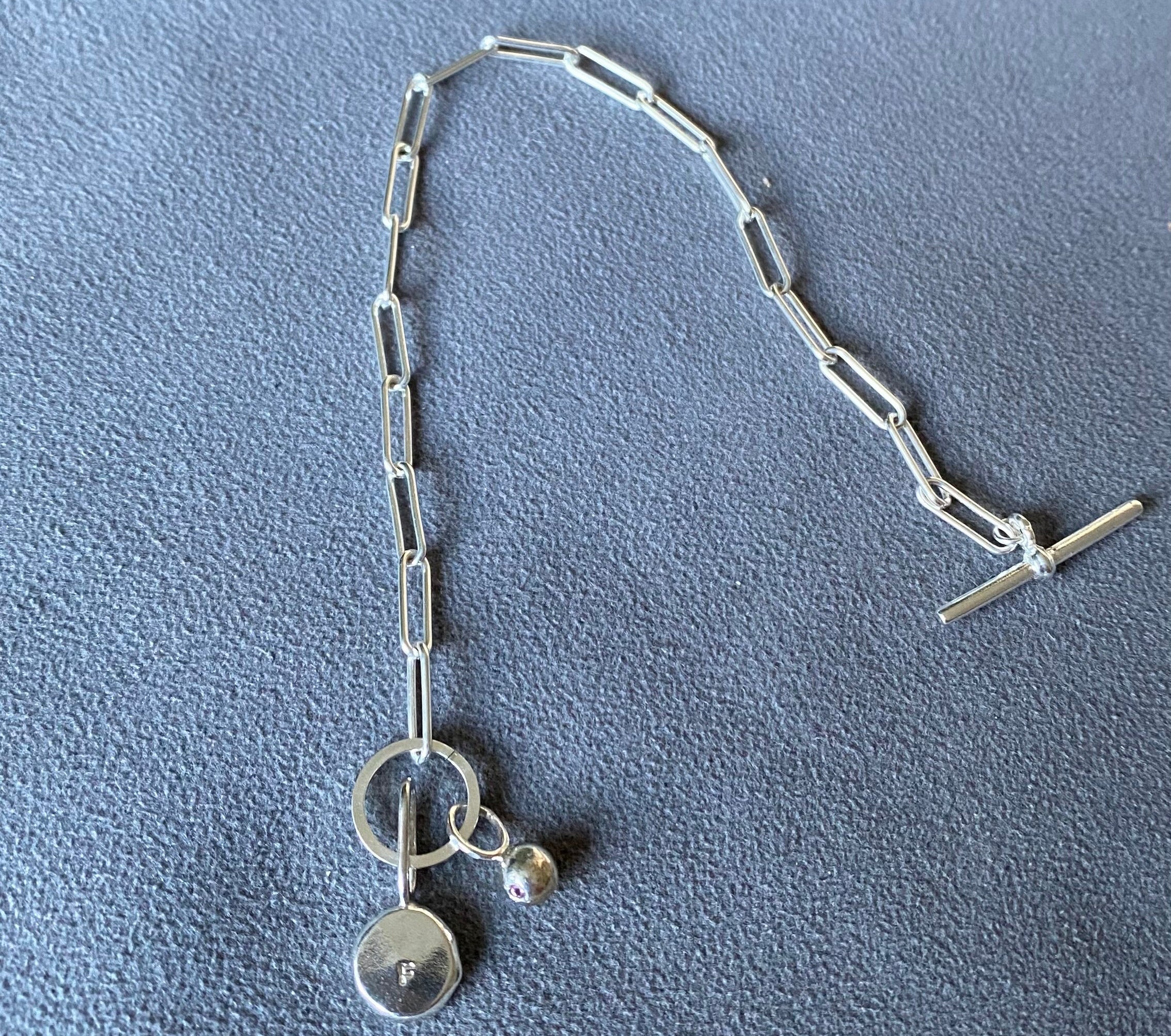 T-bar bracelet with Coriandoli charm & birthstone Pepita charm