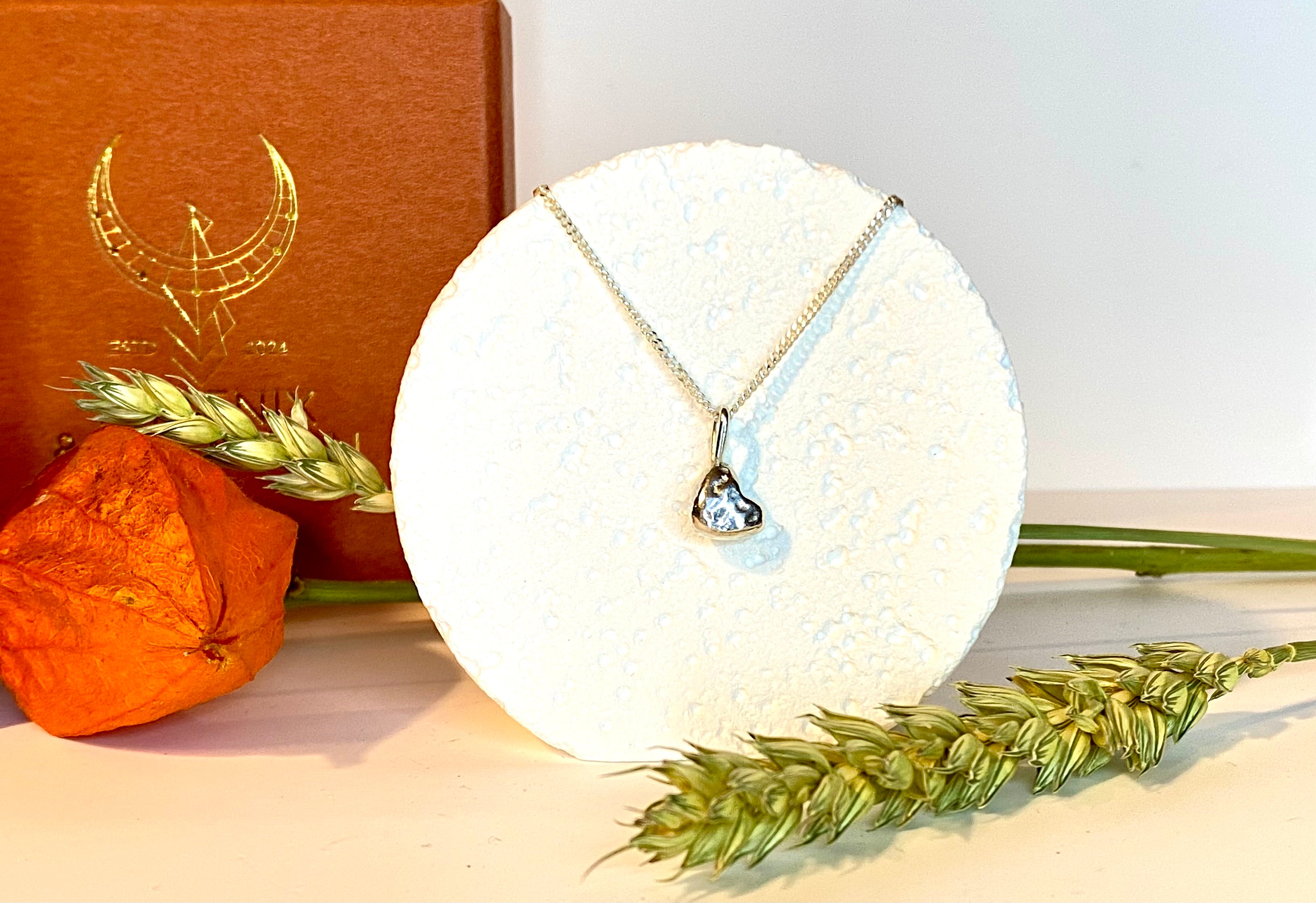 Molten heart charm necklace