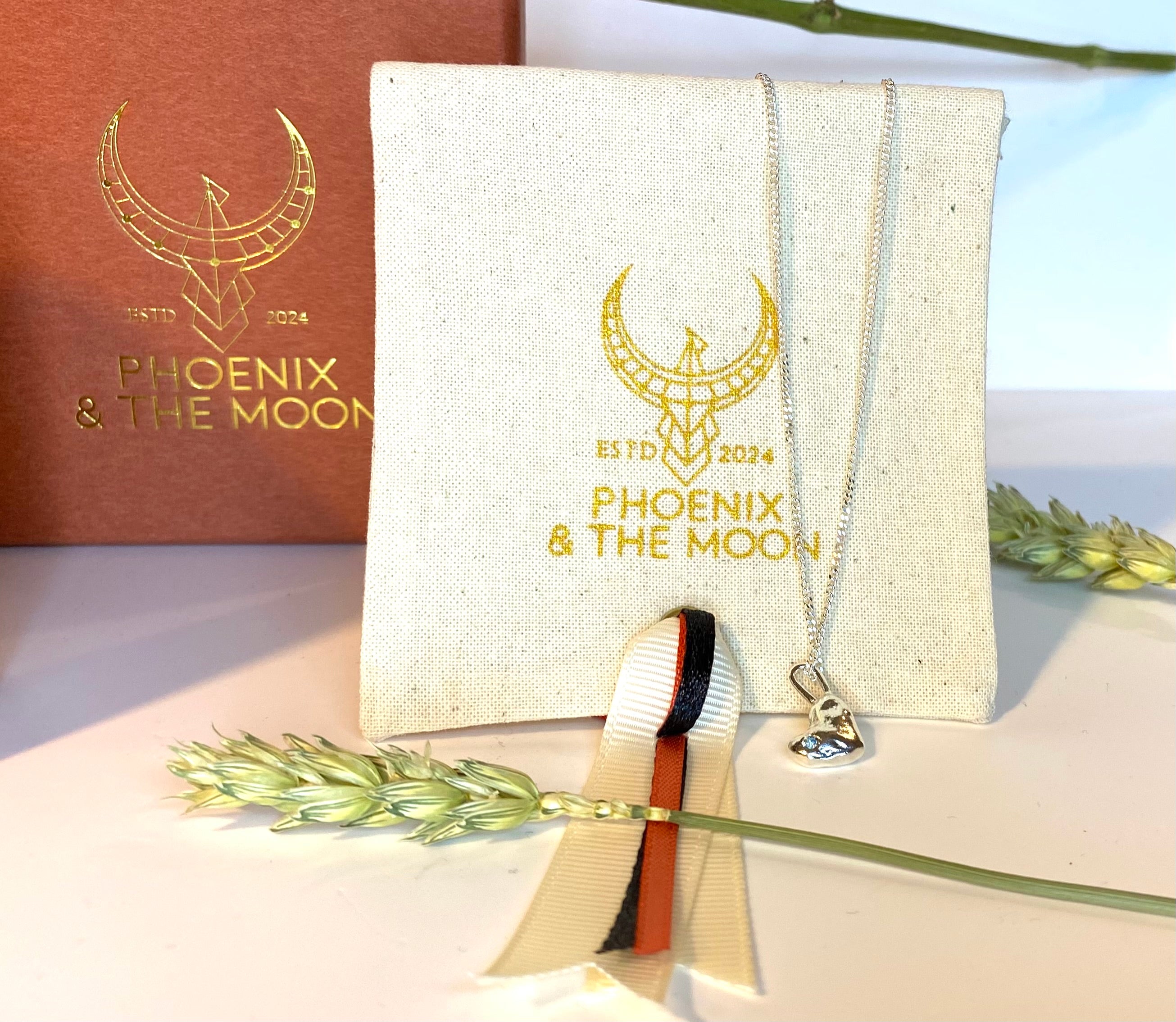 Molten heart charm necklace