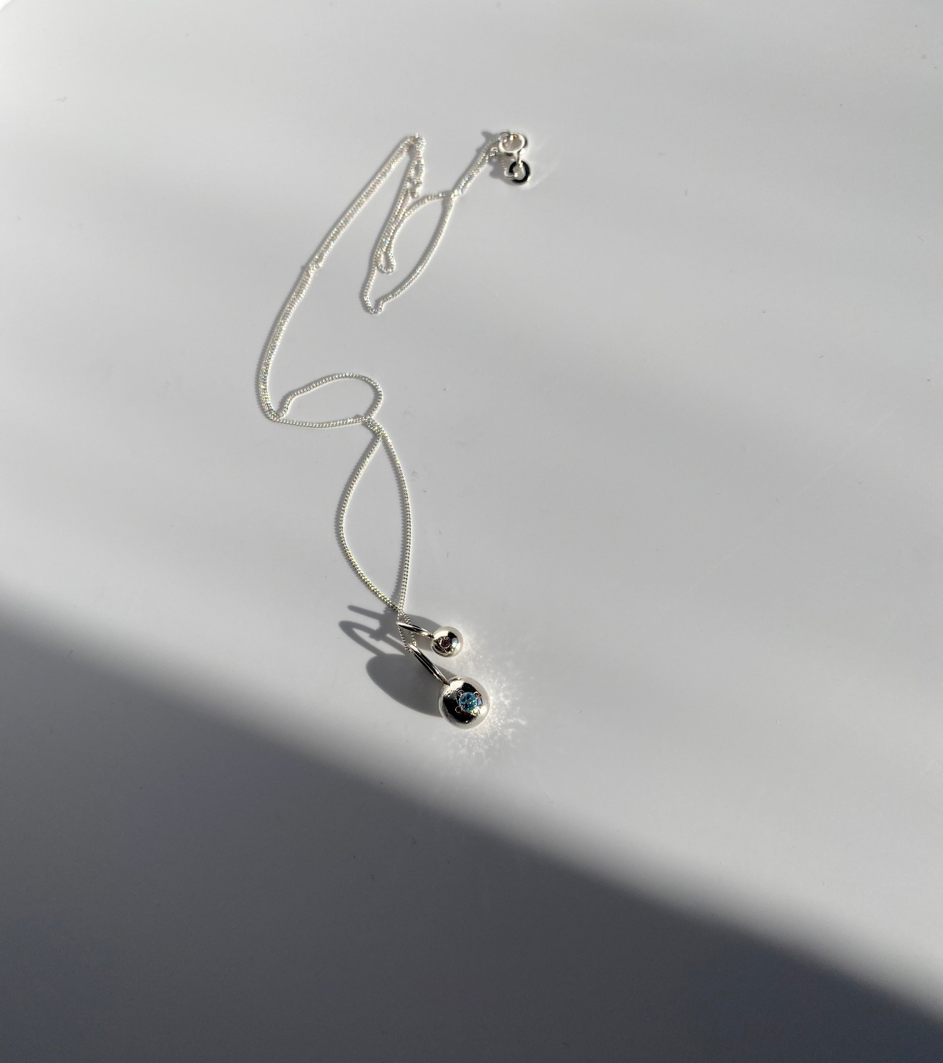 Twin organic Pepita charms necklace