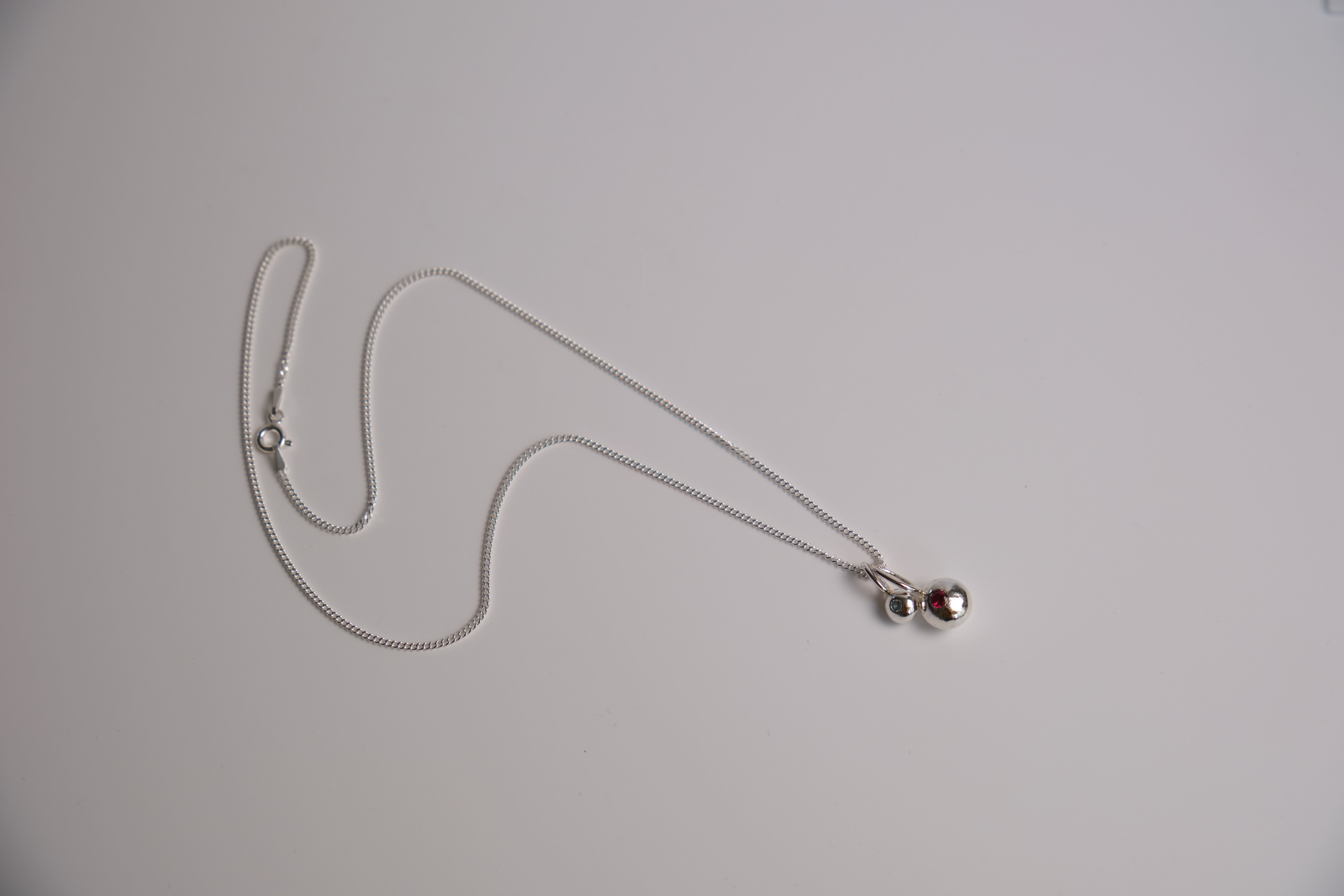 Twin organic Pepita charms necklace