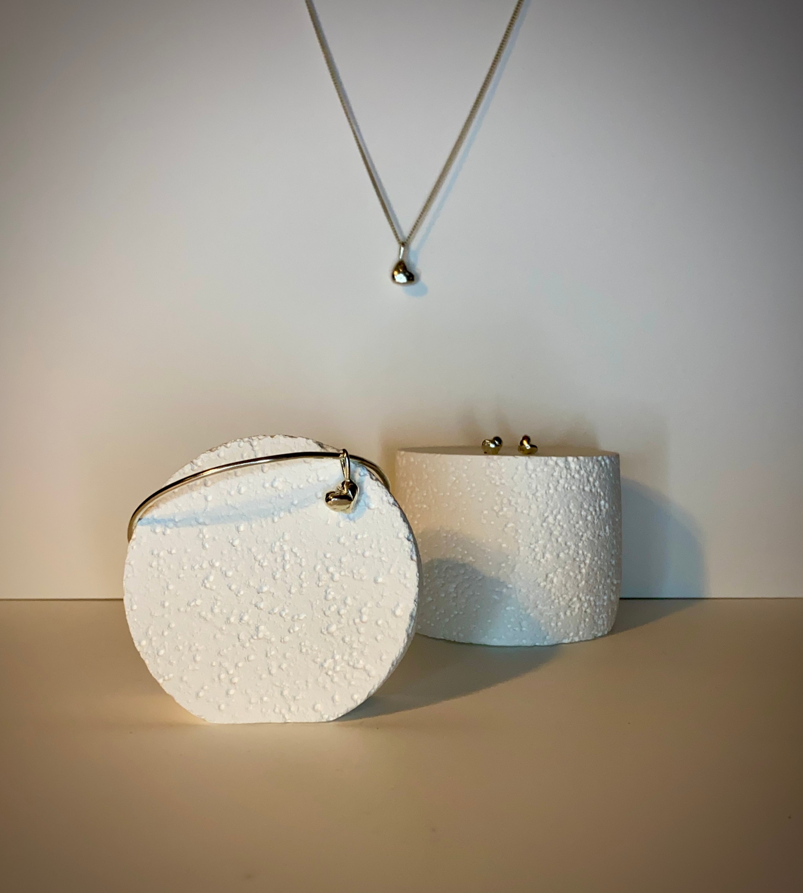 Molten heart charm necklace