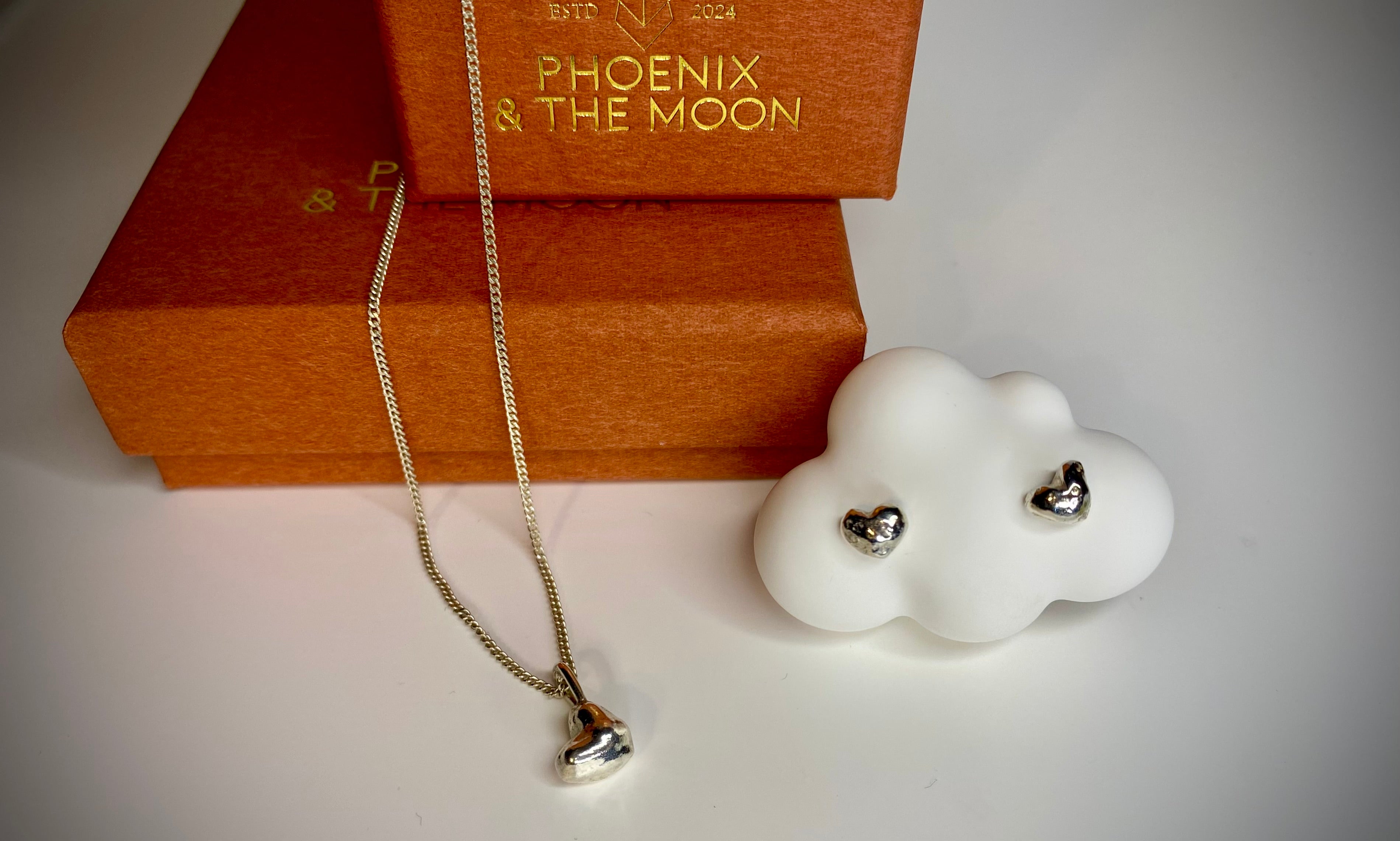 Molten heart charm necklace