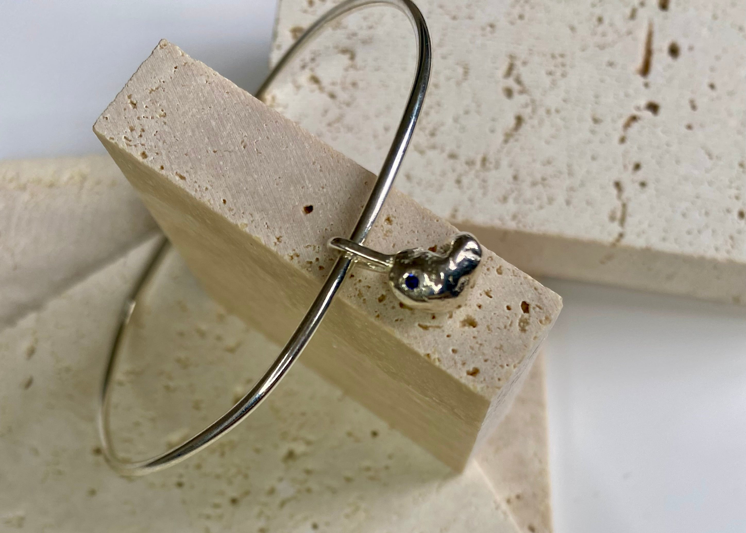 The molten heart charm organic bangle with birthstone