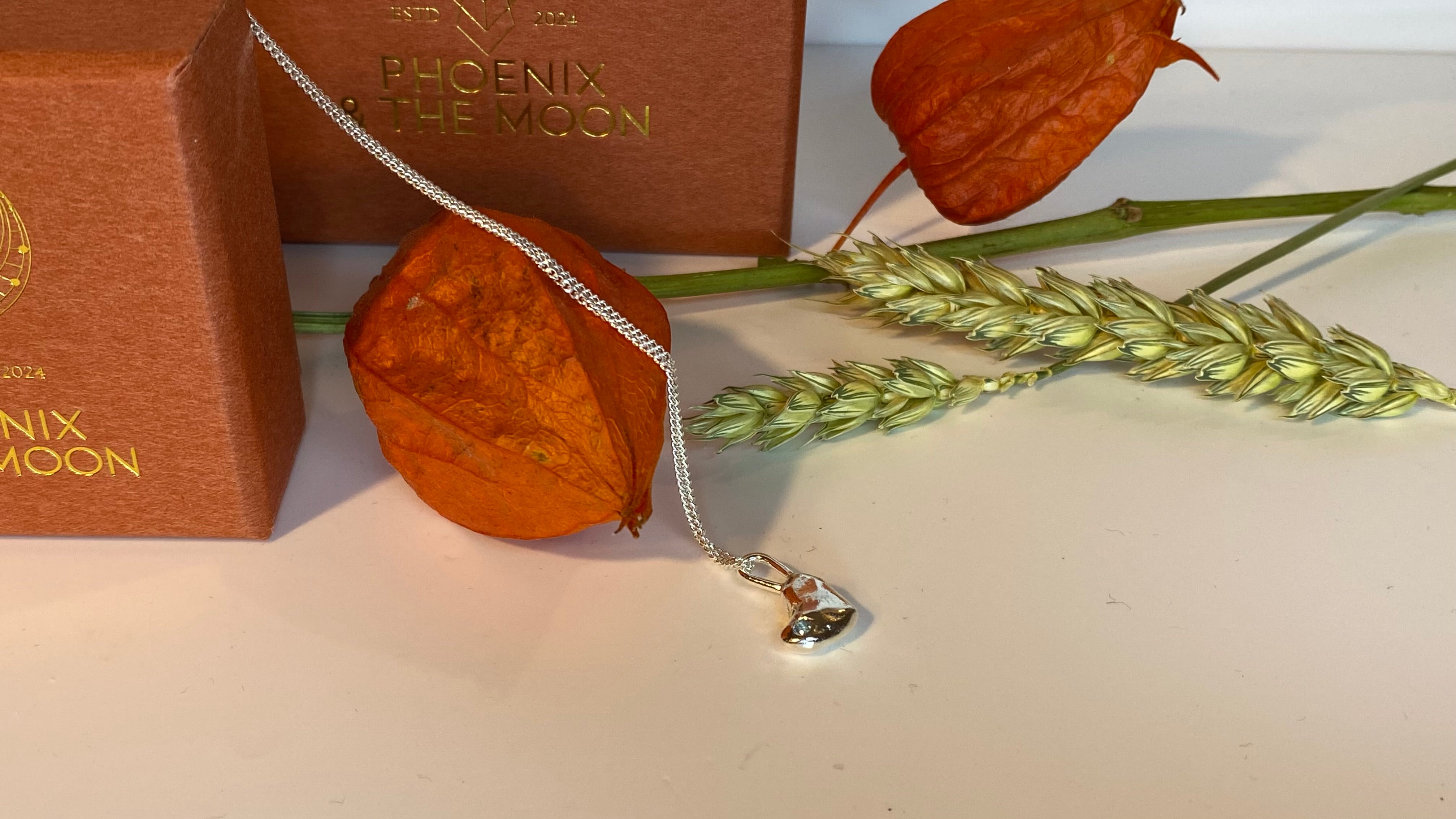 Molten heart charm necklace with birthstone